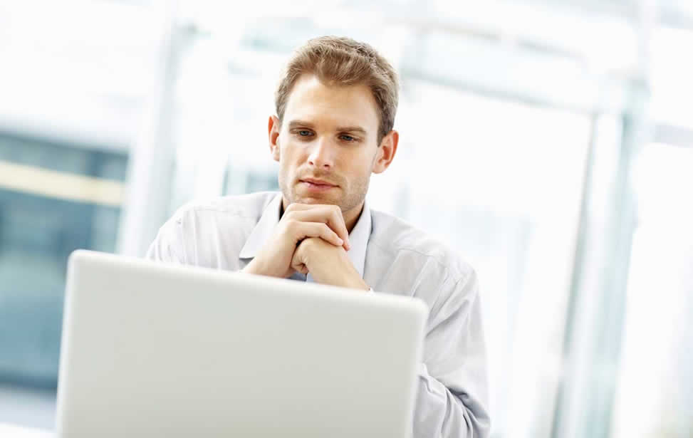 Evaluation centre. Man taking his assessment test